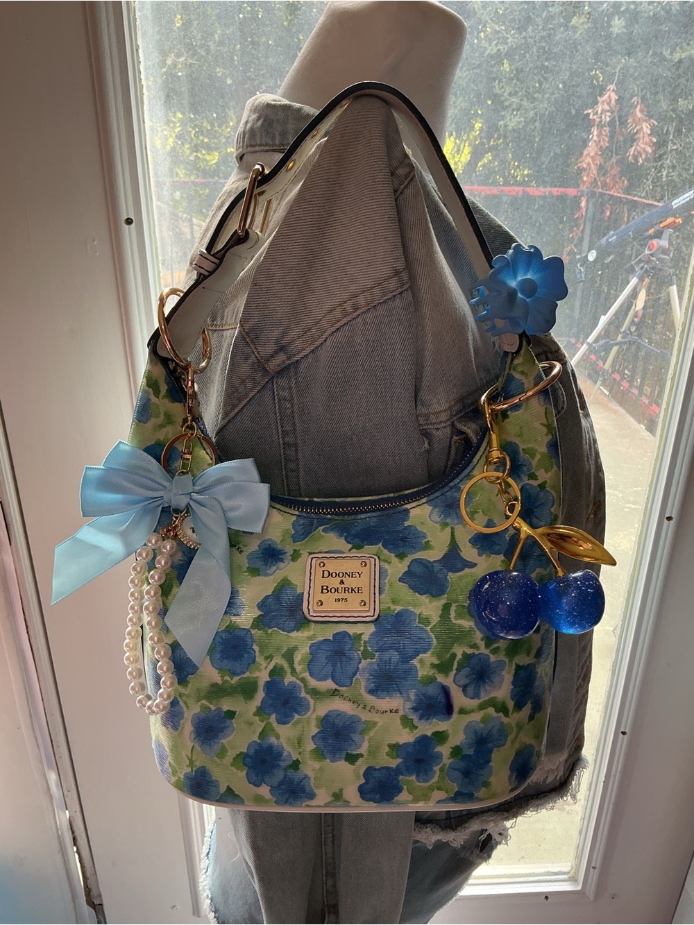 Dooney & Bourke Blue Floral Shoulder Bag with Bow Charm